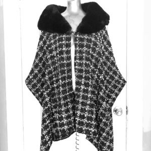 Wrap with faux fur collar. Arms slip in. Top snap